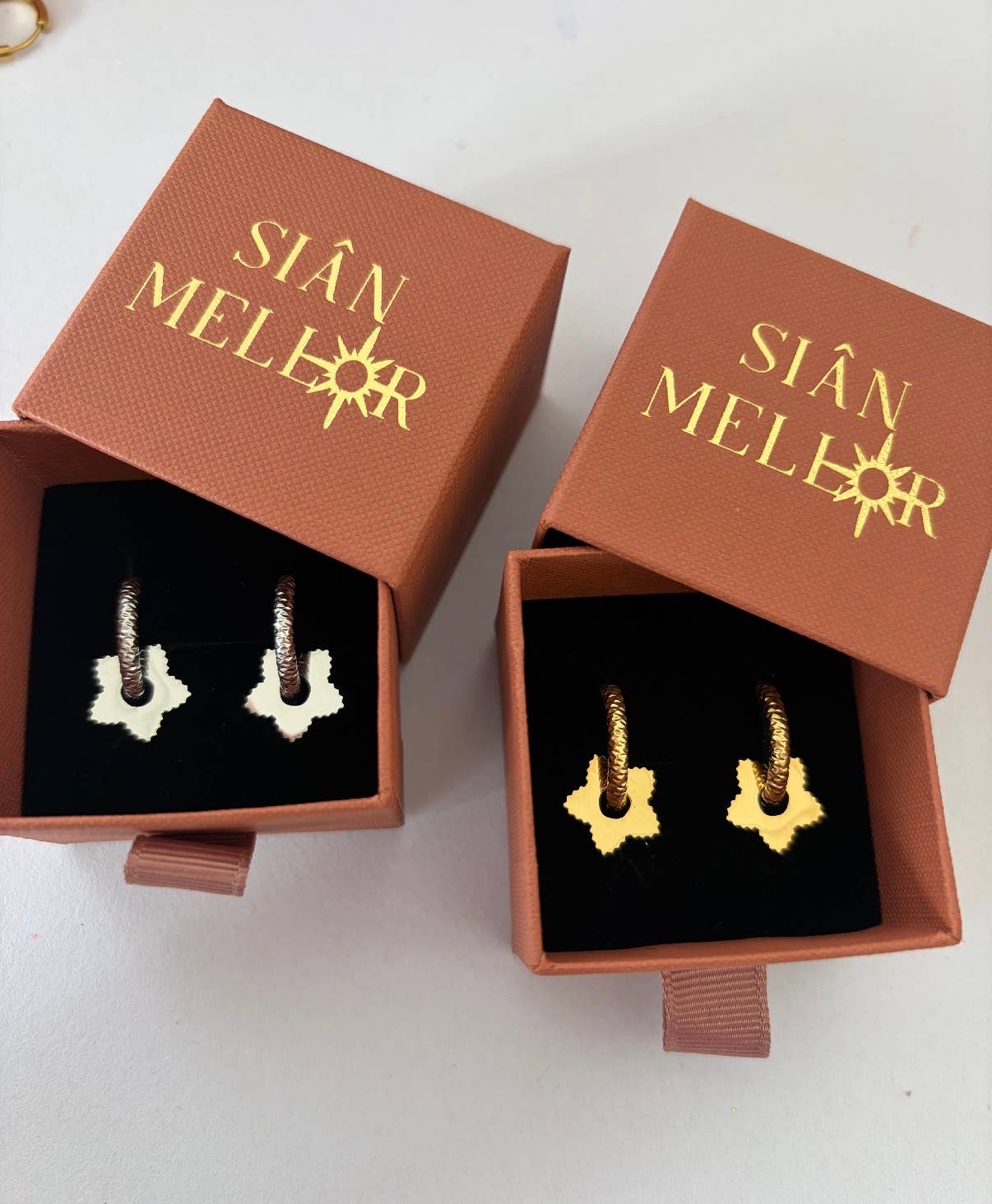 Textured star hoop earrings : Silver