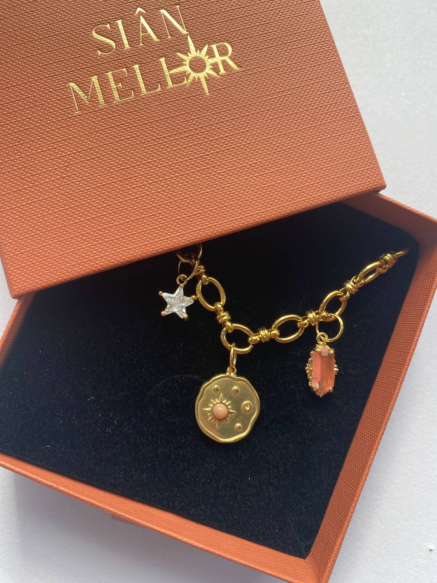 Celestial disk multi charm necklace